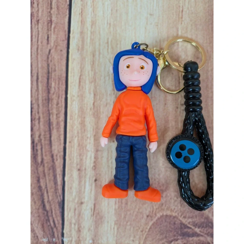Coraline Mood Doll 3D Keychain with Blue Hair Orange‎ Shirt Button Accessory